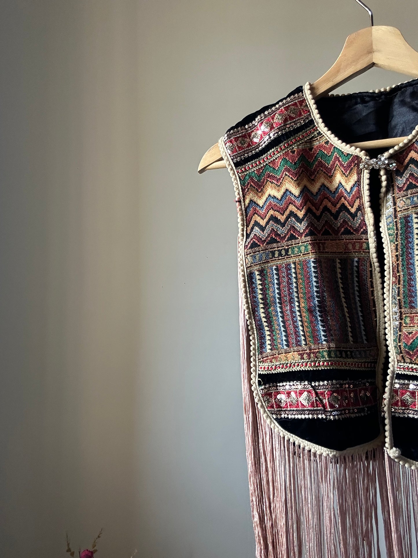 Fringe Vest With a Brooch Pin