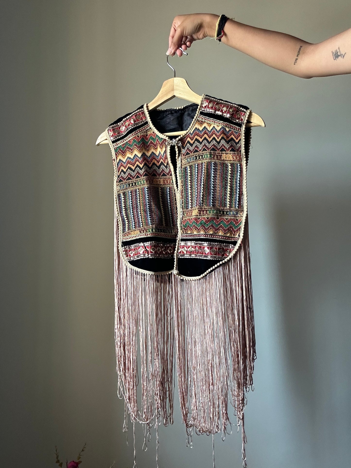 Fringe Vest With a Brooch Pin