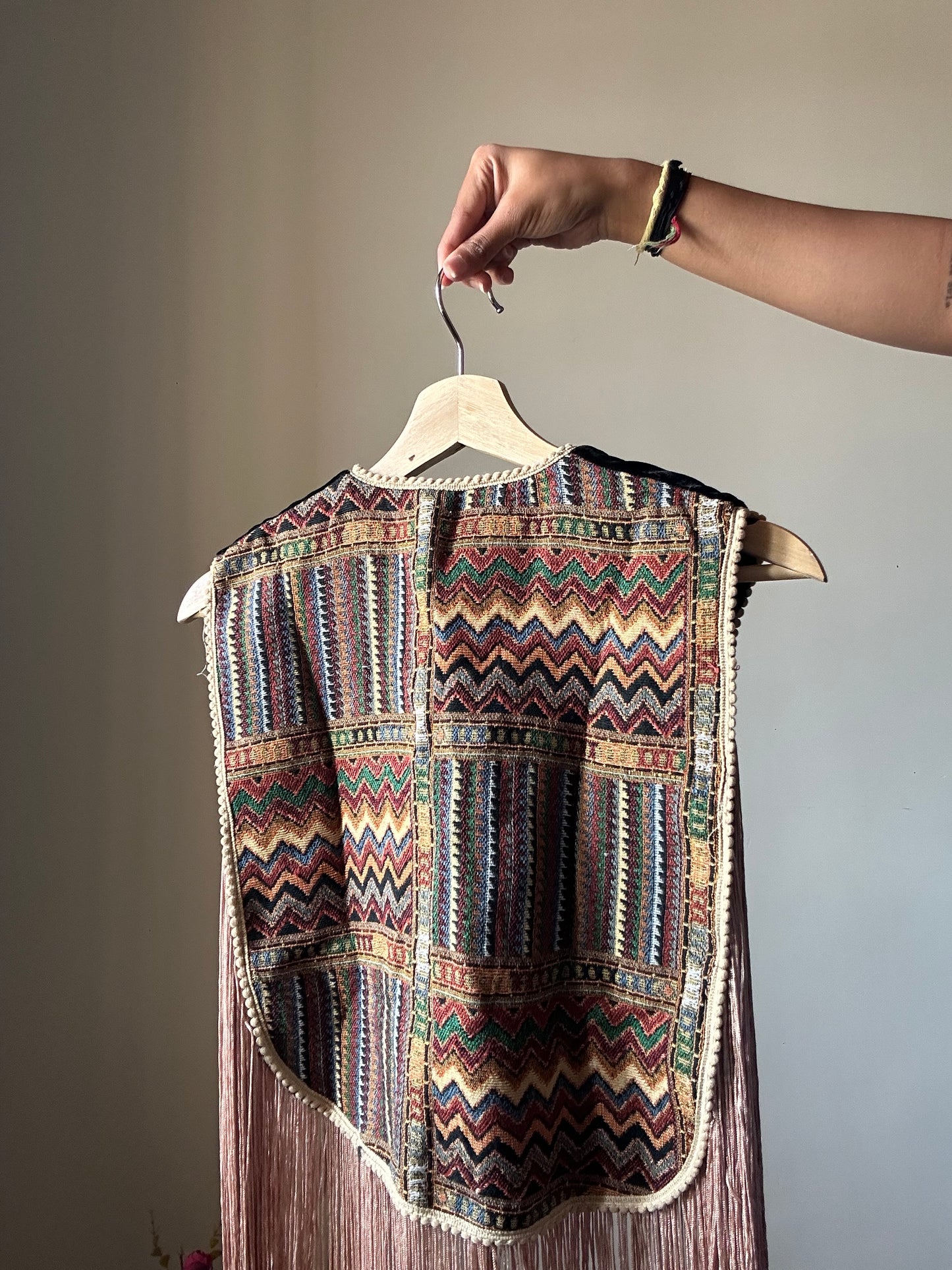 Fringe Vest With a Brooch Pin
