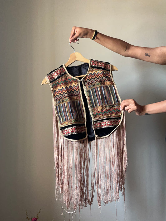 Fringe Vest With a Brooch Pin