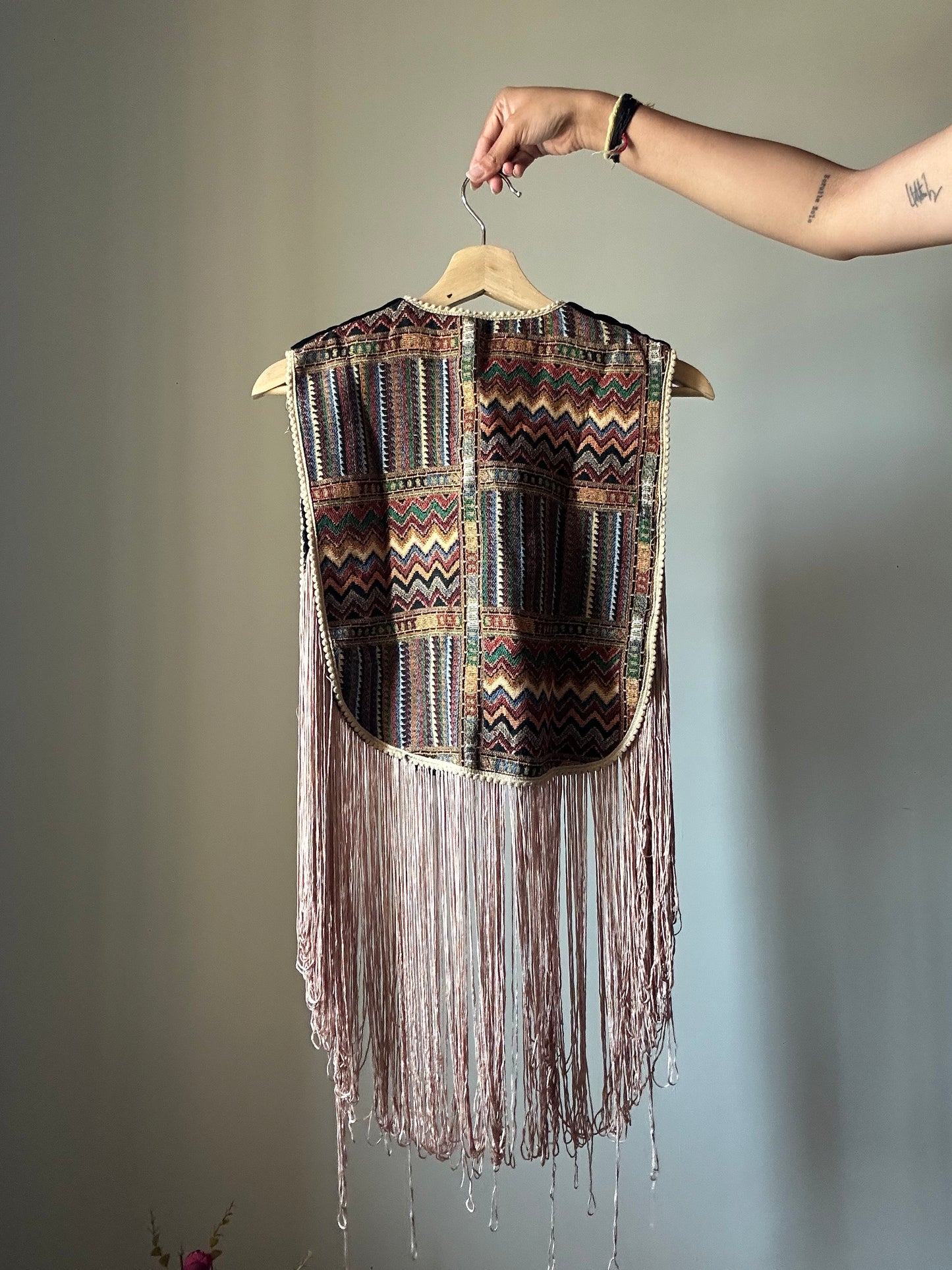 Fringe Vest With a Brooch Pin