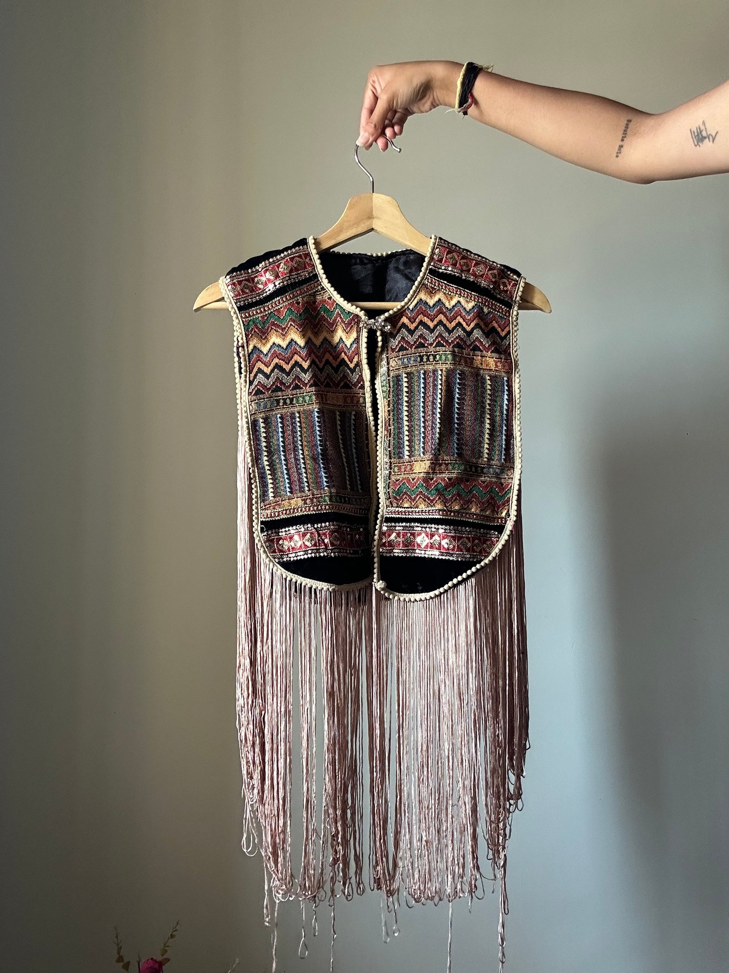 Fringe Vest With a Brooch Pin