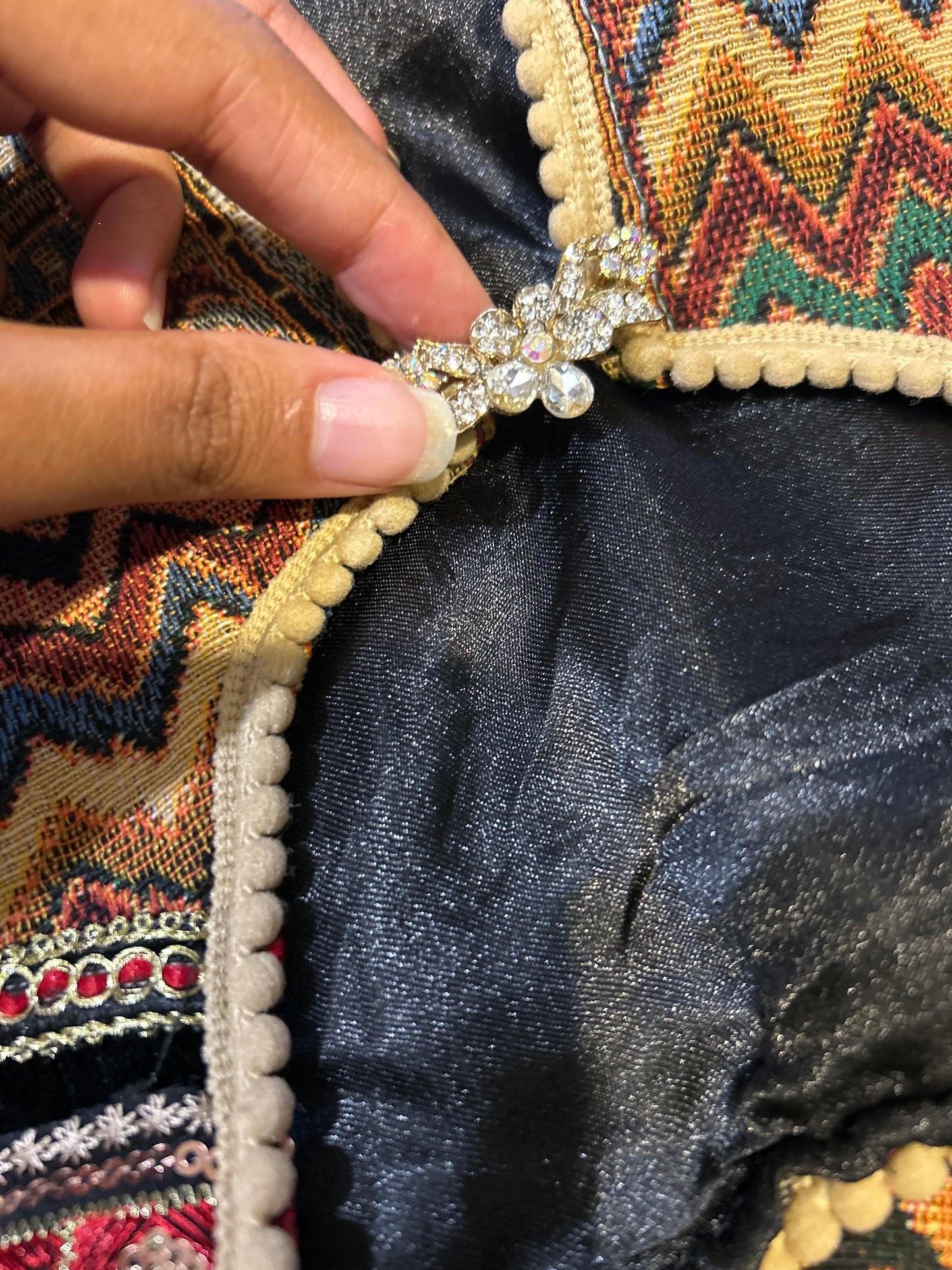 Fringe Vest With a Brooch Pin